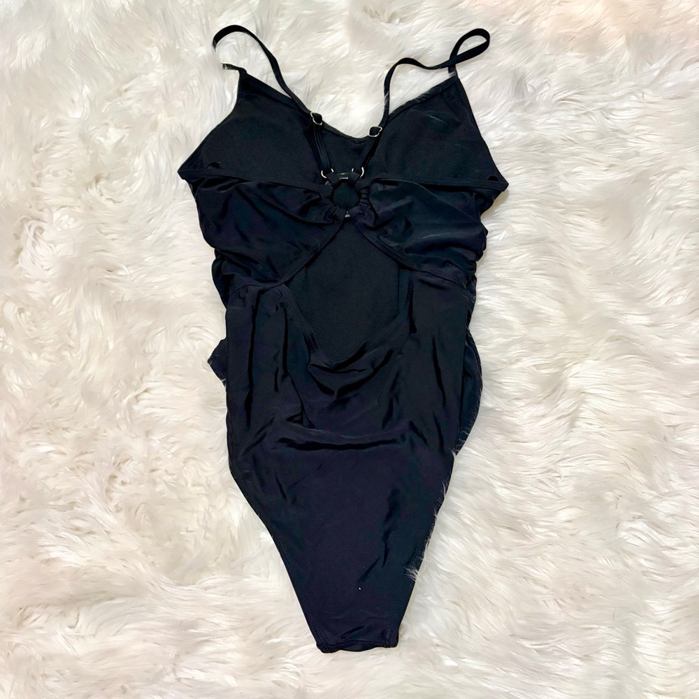Black one piece swim suit size M‎